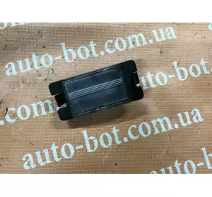 Фонарь подсветки номерного знака Mitsubishi L200 Фонарь подсветки номерного знака Mitsubishi L200